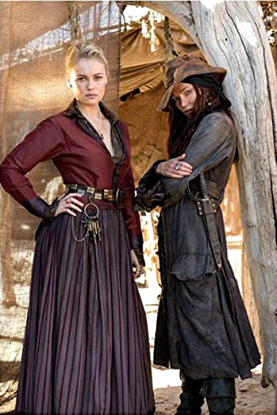 Black Sails - Clara Paget as Anne Bonny Standing with Hannah New as Eleanor Guthrie Photo